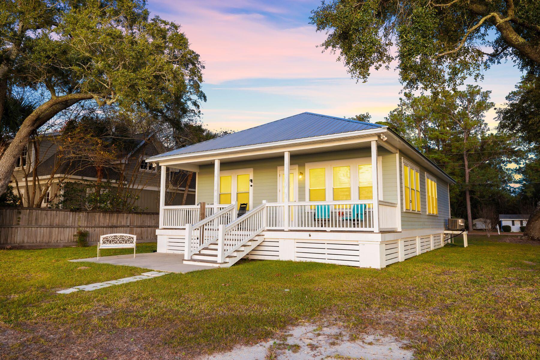 Built in 2017, this stunning Bay Grove home offers affordable bayfront living complete with a private dock. The location is unsurpassed for anyone who enjoys watersports, boating, fishing and spectacular sunset views. The lush half-acre lot has ample parking space, a barbecue area and mature trees offering privacy and shade. The new dock (2021) stretches out into the bay and is the ideal launch spot for kayaks and water toys. Just down the street, Grady Brown Park has a public boat/canoe landing. No HOA means the new owner can add a garage/carriage house or perhaps a private pool to further enhance the enviable waterfront lifestyle. Inside the home, the open floor plan is light and spacious with wood laminate flooring and superb bay views from the living room and master bedroom. The generously sized kitchen is tucked away behind a lengthy breakfast bar. Pristine granite counters, wood cabinets and stainless steel appliances make this suitable as a full-time residence, bayfront rental or tranquil bayside retreat. The dining area gives way to a sitting room where you can watch TV or simply absorb the ever-changing views through a series of low windows. The back porch is sure to be a well-frequented space for relaxing with an icy drink, lazing in a hammock or entertaining family and friends. Three beds and two modern baths, both with twin vanities, complete the accommodation. Local amenities include sports fields, a splash pad and playground at Grady Brown Park and plenty of supermarkets and eateries in Freeport. Point Washington State Forest and the beautiful beaches of South Walton are a mere 10 minutes away.