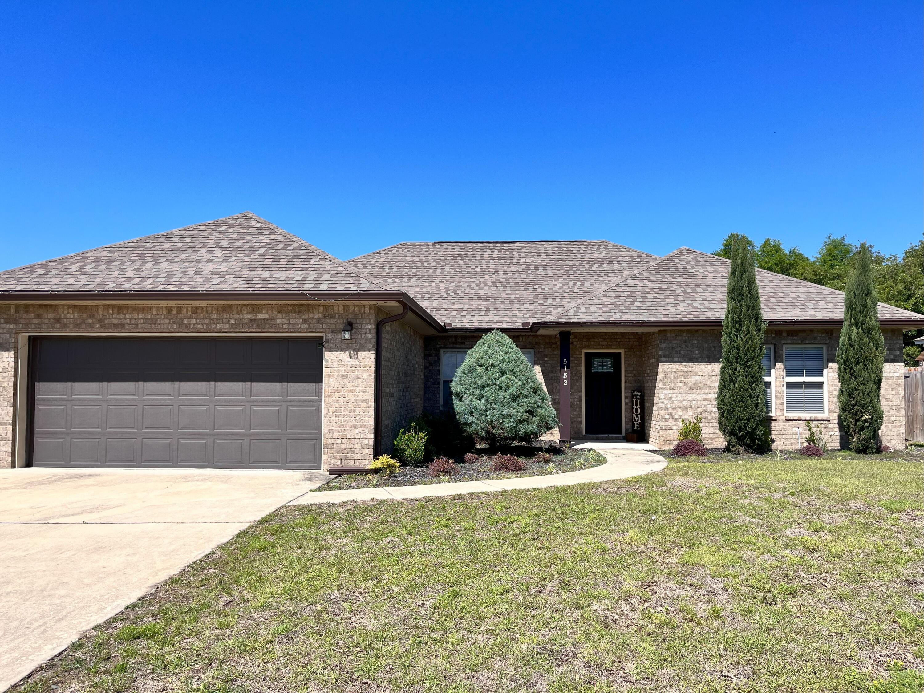Beautiful custom-built 4-bedroom, 2-bathroom home located in a quiet neighborhood convenient to both HWY 85 and HWY 285. Upon entering the foyer, you are greeted by trey ceilings, crown molding, laminate flooring, and porcelain tile throughout. The jewel of this split floor plan is the massive great room with recessed lighting; situated between the formal and casual dining areas and a gorgeous kitchen. This kitchen features granite countertops with a breakfast bar, stainless steel appliances to include a smooth top range, microwave hood, dishwasher, and 36' upper cabinets for ample storage. Prepare meals and overlook your privacy fenced backyard and covered patio all while staying connected with your guest.