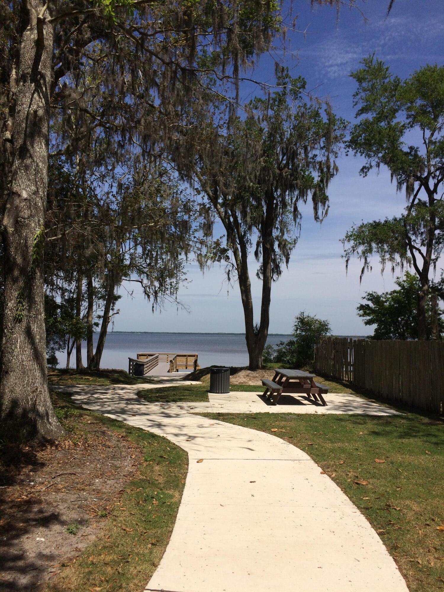 Grayton Bayou is quickly developing into one of Point Washington's most desirable neighborhoods. With quiet tree lined streets, bay access and community pool, Grayton Bayou is graced with homes exhibiting a relaxed coastal cottage lifestyle. This lot is high and dry in flood zone X, and is accessed by a private alley off Dawson Road. ** Owner is a licensed Florida Realtor. All information contained in this listing is believed to be accurate, but is not guaranteed.**