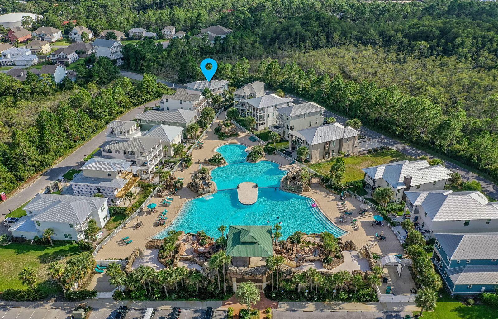 This beautifully updated 5-bedroom, 3,421 sq ft home in the gated community of Cypress Breeze is located steps from the resort-style community pool and less than a mile from the beach. Built as a custom home by the original builder, it's filled with upscale finishes and thoughtful design. The first floor features a private guest suite with a full kitchen, bathroom, living space, and queen bedroom--perfect for guests or extended family.The second floor offers an open layout with a large kitchen, breakfast bar, dining area, and the primary suite with private bath and balcony. On the third level, you'll find three spacious guest rooms, two updated bathrooms, and a cozy loft with a daybed and TV.Located in a near Gulf Place with shopping, dining, and events. Golf cart is included!