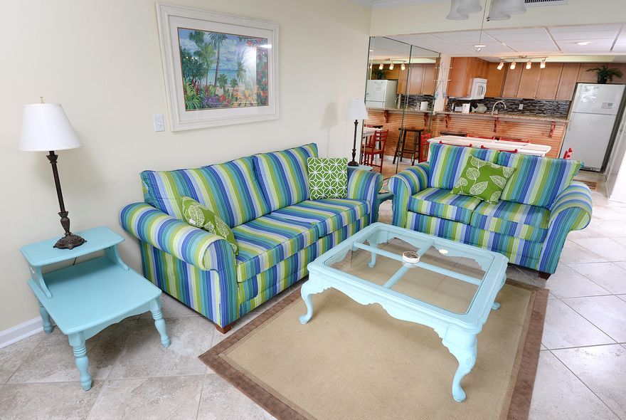 $10,000 PRICE DROP! **UPGRADED, UPGRADED, UPGRADED** This 1BR/2BA unit at Pelican Walk has been COMPLETELY RENOVATED. The owner installed gorgeous tile throughout the entire unit for ease of maintenance then really went after the kitchen. New cabinets, glass-tile backsplash and granite counter tops really make the kitchen stand out while the bead board adds to the beachy feel while protecting those easy to ding areas. This wonderful unit also features updated lighting and in the bathrooms you will find some new cabinetry. Enjoy awesome views from units on this side of the building and all of the wonderful amenities that Pelican Walk is known for: handball/raquetball courts, 2 gulf front pools (one heated), hot tub, tennis court and rec room. This unit is being offered