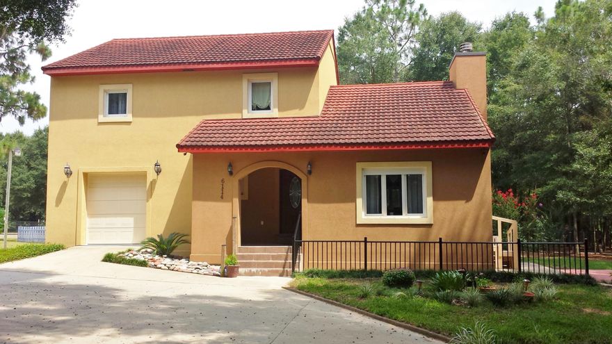 Gorgeous! Horse Lovers Paradise 2bed /2.5 bath 2008 Custom Built ICF Mediterranean Style Main House (1938 sf) and a Second 3 bed/2 bath Ranch Style Home with screened porch built in 1965 (1232 sf). Features In ground Pool, Horse Barn with 4 working horse Stables, a 200ft x 60ft Riding Arena and large Workshop is situated on 4.73 acres with a Private Drive! A beautiful mixture of trees and vegetation. more..SEE SUPPLEMENTAL FOR MORE DESCRIPTION.Property Appraiser has some information listed incorrectly currently.All information is approximate and should be verified by buyer.