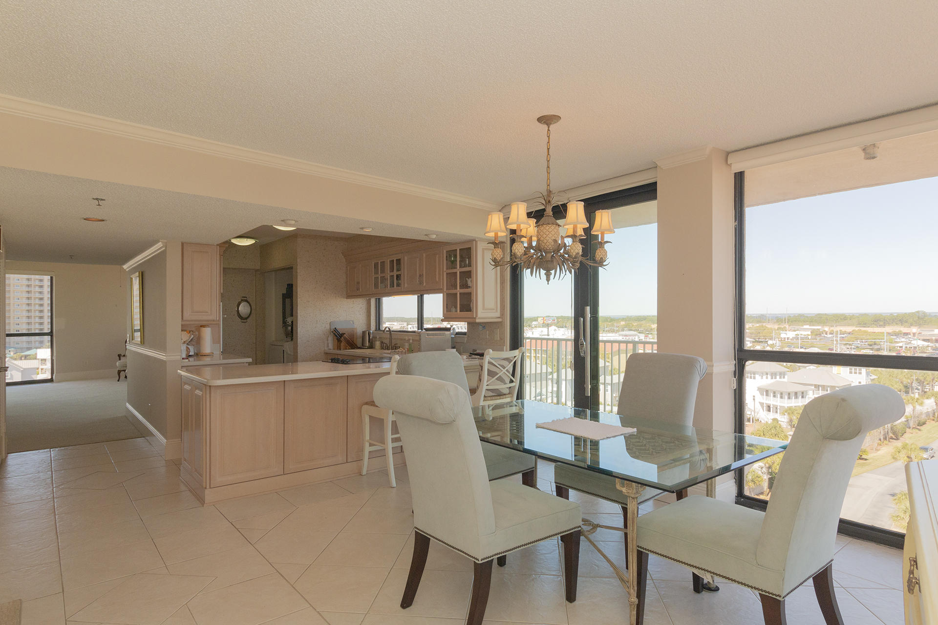 Don't miss this amazing opportunity to own this top floor, end unit condo at Mainsail. This partially furnished, 2BR/2BA, 1,340SF unit features amazing coastline & panoramic view, plus $40,000 upgraded hurricane doors. As you step into this condo you are greeted by an open dining & kitchen area with amazing view of the bay. Entering the living space there are vaulted ceiling with additional windows and panoramic bay, gulf, & beach views. From the living room you have access to gulf and bay side balconies. The master suite has amazing views, balcony access, large walk-in shower & plenty of closet space. There is also an additional bedroom & a hallway full bath. Mainsail amenities include 24hr security, 2 large pools, tennis courts, and 700FT of deeded beach. See you at the Beach!