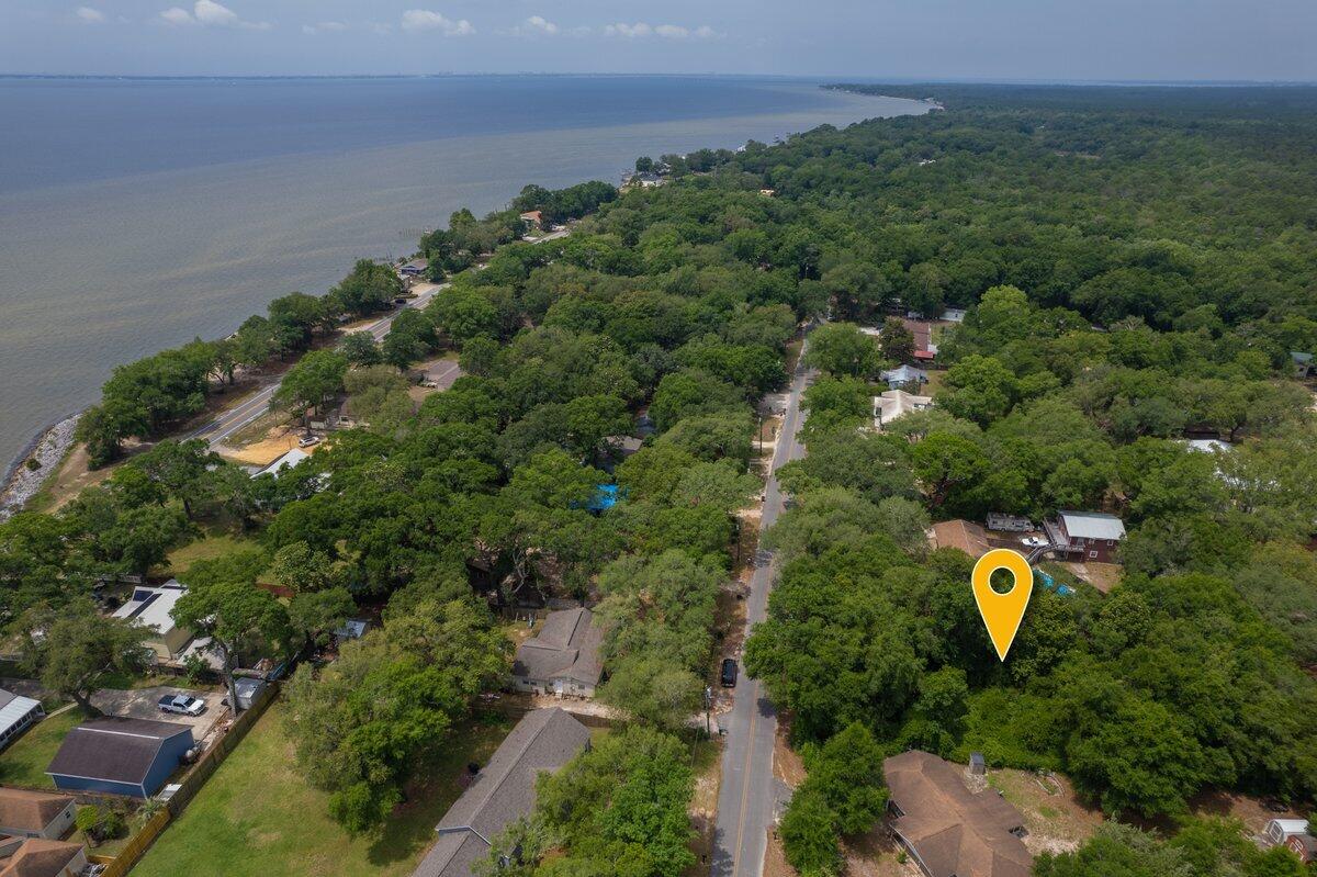One of the last available lots on Live Oak Street in Choctaw Beach! BEAUTIFUL lot with gorgeous trees and only 1 street back from Highway 20 and the Choctawhatchee Bay! Peace and serenity can be found here, I'm proud to say I grew up in Choctaw Beach and have always loved it! Perfectly located to everything the Emerald Coast has to offer.  Don't miss your chance to build and create your piece of paradise.