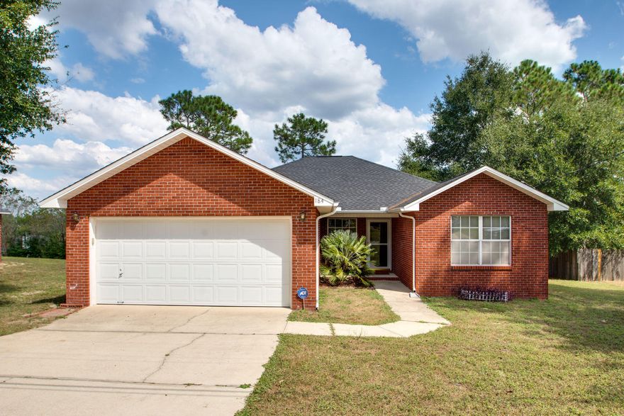 What a Gem, South of I-10! Brand new roof with 50 year architectural shingles! Great room features vaulted ceiling. Kitchen is nice sized with lots of cabinets, breakfast bar and sunny dining area. Split bedroom floor plan. Large Master has a trey ceiling. Master bath features a lovely garden tub/shower combo and walk in closet. Extend the living space with the enclosed Sunroom, with sliding glass windows and screens for capturing cool breezes. The 2 car garage features a laundry tub, side door for easy outdoor access, and pull down stairs to the decked attic, that is so large, you can walk around while standing up! Large backyard is fully privacy fenced with a yard building and open patio. Security system and Key pad entry complete the extra details you're going to love about this home.