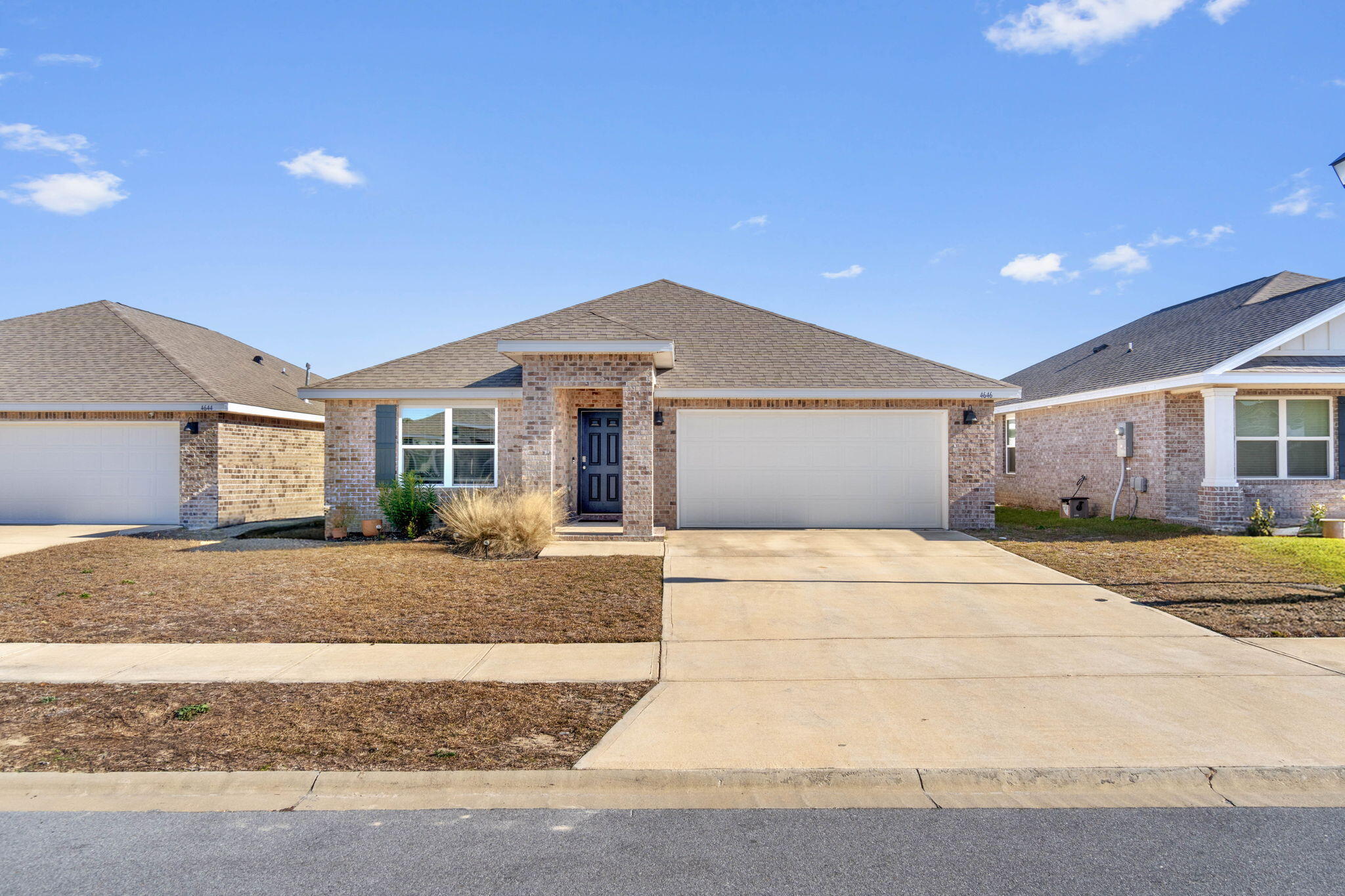 Welcome to this beautiful 4-bedroom, 2-bathroom home, built in 2021, located in the Patriot Ridge neighborhood, featuring underground utilities, sidewalks, and a community pool. Step inside to discover a spacious, open-concept layout featuring LVP flooring, perfect for easy maintenance. The kitchen boasts an island, along with granite countertops, and classic white cabinetry, making it the perfect space for cooking and gathering.The split floor plan offers plenty of privacy, while the primary bedroom features a walk-in closet and an en-suite bathroom with a dual vanity. Enjoy outdoor living with a fully fenced backyard and covered back porch, great for relaxing or grilling out. The two-car offers additional storage and has a NEMA 14-50 125/250V outlet for electric vehicle charging.