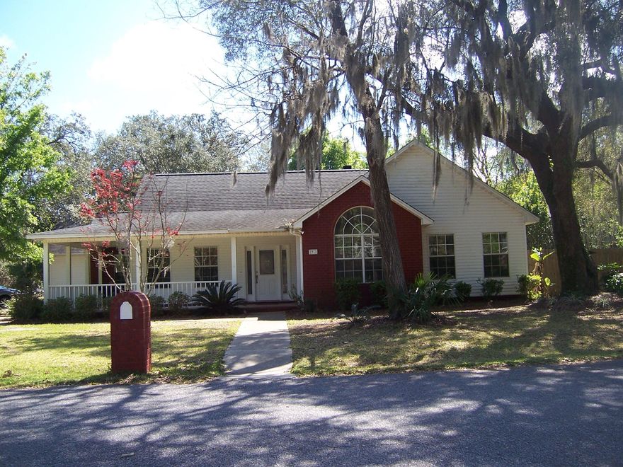 Pull into this beautiful secluded neighborhood with lots of trees. This wonderful home is on a large corner lot. Nice and big front and side porch. Detached 2 car garage with a covered walkway into the house. Nice size rooms with lots of storage. Good size utility room. Then walk through the French doors to the screened in pool. Liner was replaced in 2016. Plenty of back yard to play in with a pear and an apple tree. All information is deemed correct but should be verified by Buyer