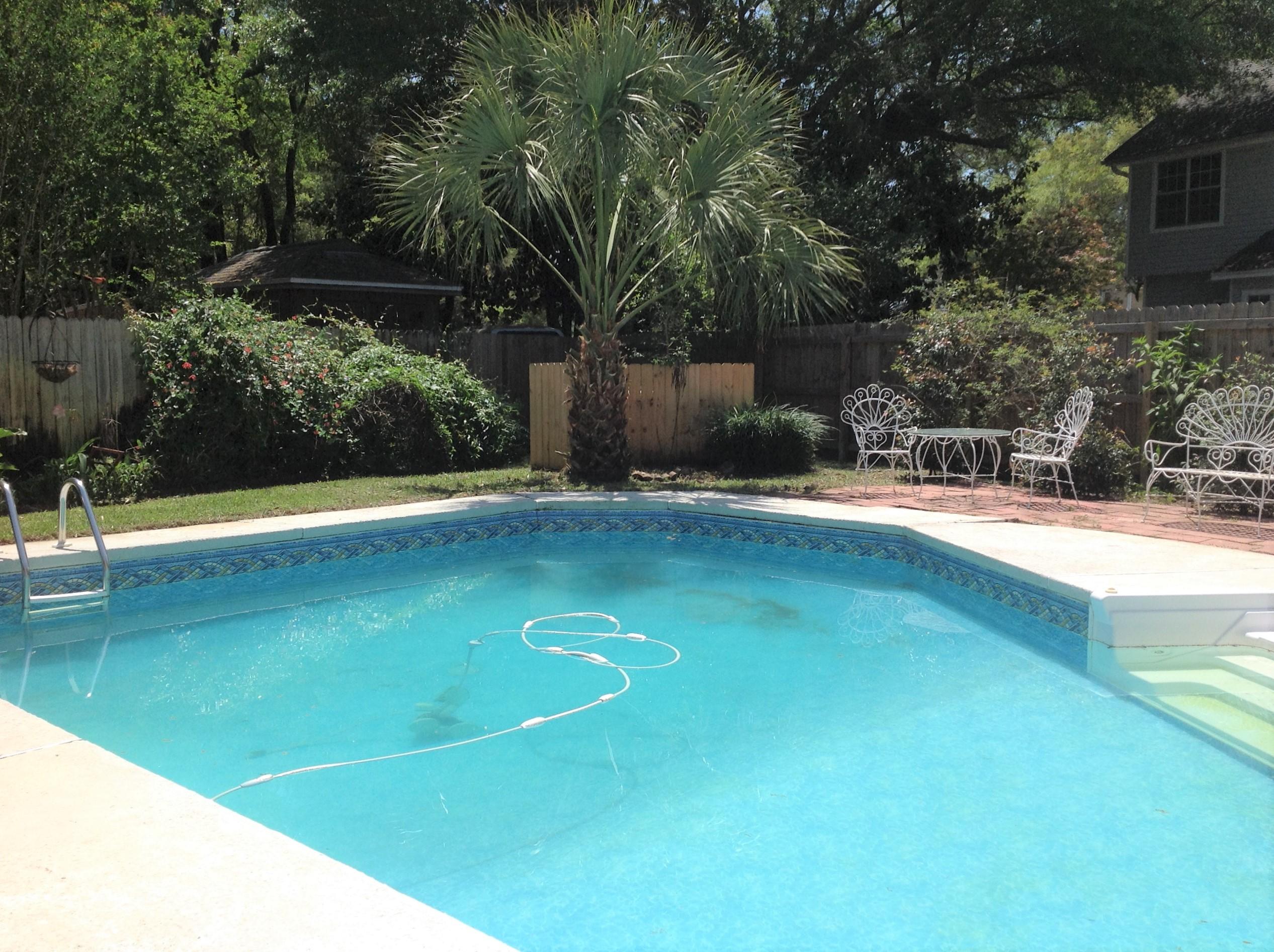 Desirable Shalimar Executive Community. Deeded access community waterfront park and dock.This spacious, newly updated home in the desirable Palm Shores neighborhood has 5 bedrooms and 3 and a half bathrooms. With two living spaces, a breakfast nook, eat in kitchen, and formal dining room, this house is perfect for entertaining. The large kitchen has brand new stainless steel appliances. The master bedroom is on the first floor with direct access to the pool and patio outside. The master bathroom was just updated with walk-in shower, garden tub, and double vanities. Upstairs you'll find 4 spacious bedrooms and two full bathrooms, with an open walkway to the living room below. There is new paint in almost every space in the house.