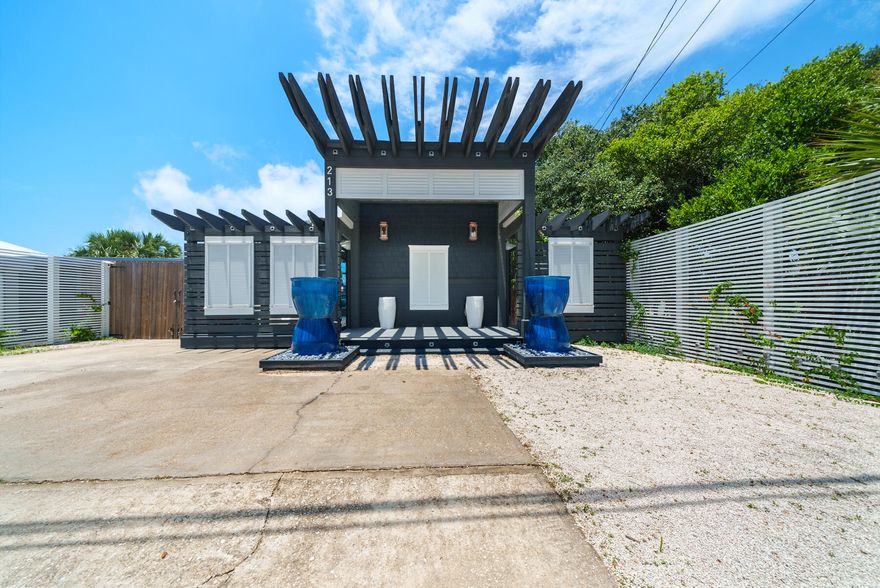CASH INVESTORS ONLY!!!!Welcome to this beautifully upgraded, fully furnished, mobile home that defies expectations and delivers a unique living experience. This property, currently a rental, offers the perfect blend of charm and modern amenities, ideal for short-term rentals or as your dream home.Location is everything, and this gem is perfectly situated just 0.2 miles (a 1-minute walk) to Public Beach Access 82, 8 minutes (5 miles) to the famous 30A, and 9 minutes (5 miles) to Pier Park in Panama City Beach. Enjoy all the best that this area has to offer from the comfort of your luxurious home. The facade has been meticulously upgraded, featuring a stunning front entry with an arbor detail constructed from marine-grade materials, ensuring both durability and aesthetic appeal. The outdoor living space includes a spacious 50' x 12' deck, perfect for entertaining or simply relaxing. An 8' x 8' jet grand acrylic spa with a lounger, and an outdoor shower, add to the resort-like feel of this property.

Step inside to find elegant updates throughout. The kitchen boasts new quartz countertops, stained solid 3/4 cypress tongue and groove wood, and decorative wall wainscoting that adds a touch of classic charm. The cast iron Kohler farmhouse sink is both stylish and functional.

An additional highlight is the 21' x 12' additional third bedroom, adorned with beach house plank weathered white tile, which can be utilized as a bedroom, home gym, or office, offering versatile living options.

Don't miss out on this rare opportunity to own a property that combines the convenience of a mobile home with high-end upgrades and a prime location. Schedule your showing today and experience this unique home for yourself!