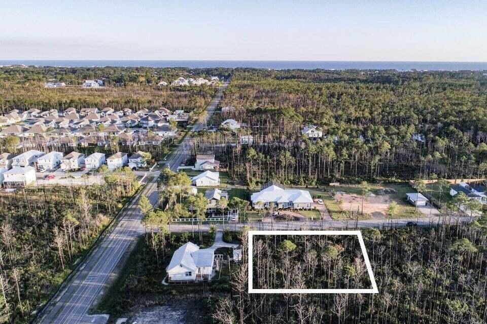 1/2 an acre lot on the South side of 98 in DUNE ALLEN! Build your perfect beach home up to 3 STORIES with detached or attached garages and sheds on this residential lot in Thompson Plantation, a 17-home community south of Highway 98 on the west end of Scenic Highway 30A. There is no build-out time, no formal HOA ever established and no through traffic. Please ask your Agent for the Deed Restrictions. The lot is only 1 1/2 miles from the sugar-sand beaches of the Emerald Coast and near numerous shopping, dining and recreation opportunities. Being South of Hwy 98 allows you the opportunity to golf cart to the beach from your new home, or better yet bike ride as the paved boardwalk leads you the entire way.