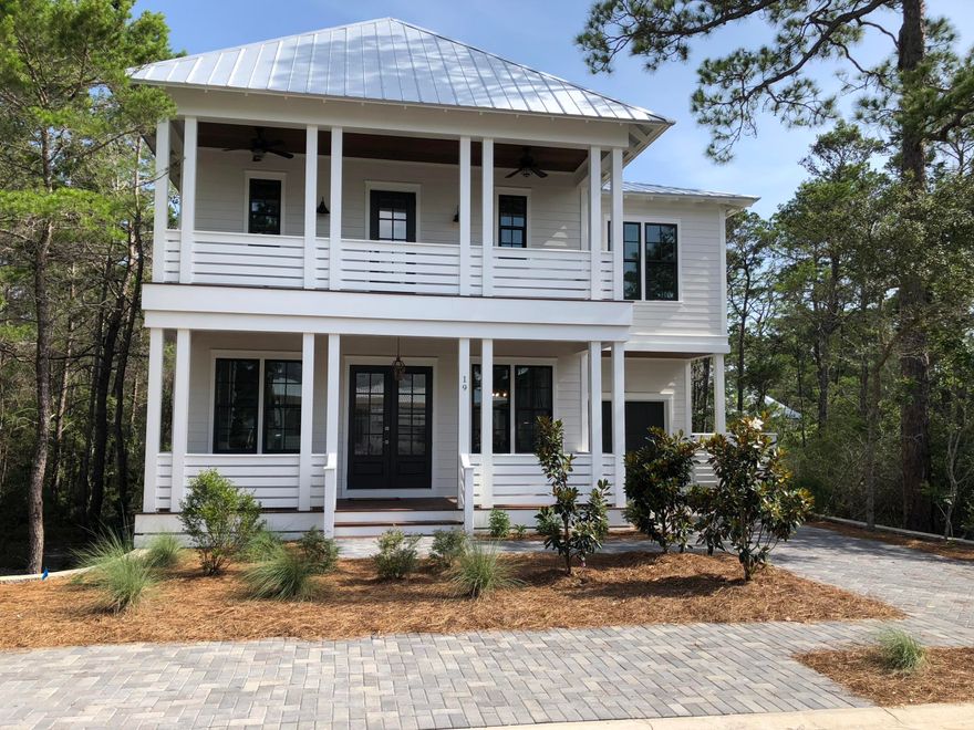 This elegant Florida Cottage style home in the highly coveted private subdivision of Lakeside at Blue Mountain Beach offers everything a family could desire for either a permanent home or a beach rental. With 10 foot ceilings upstairs and down, two master suites, a walk in pantry, a mudroom, an office and a media room, this spacious home offers designer elements and comfortable living. Some of the upgrades include Impact windows, solid core interior doors, spray foam insulation under the home and a natural gas tankless water heater. Golf cart distance to the beach makes this an enjoyable home for any family.