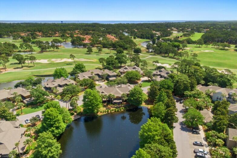 LAKE LOCATION- UPDATED & FULLY FURNISHED- RENTAL READY- GOLF CART INCLUDED! Perfectly located in the Sandestin Golf & Beach Resort, Magnolia Bay is located across Baytowne Avenue from the Tennis/Pickleball Center, Marina, Baytowne Village,and the Beautiful SOA Pool! Jump on your golf cart and you are minutes away from the Beach and all the upscale shops, restaurants and entertainment in Grand Boulevard and The Market Shops! Upstairs is the Primary Suite with large closet, sitting area, and ensuite bath. Also upstairs are 2 aditionalspacious Bedrooms, guest bathroom and Laundry Closet. As you walk in the Main Level through the entry the garage access is to the left and a Guest Bathroom, and storage closet on the right. Kitchen has updated stainless appliances, cabinetry, and countertops. Furnished throughout with Designer touches all items will remain with townhome including all electronics and appliances. HOA Fees include All Landscaping, Cable TV, Pool & Garbage Pick Up