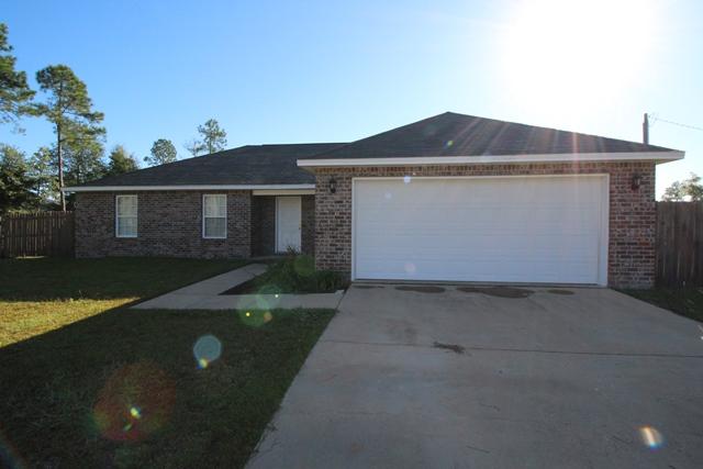 What a great 4 bedroom home for less than 120. This home is in the Pines neighborhood on a large corner lot and on a paved road. Features include a large open floor plan with split bedroom, tile floors in bathrooms, vaulted ceiling. walk in pantry and marble window seals. The master has a double vanity, water closet, tile floors and walk in closet. This home is a great buy with a large flat yard with fenced in back yard and low county taxes! Buyer to verify room dimensions. Seller is offering a $1000.00 flooring allowance.