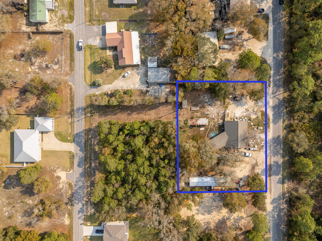 This property includes: 2 vacant cleared lots - .34 acres A commercial shop - .75 acres Duplex - .43 acres 2 Single Wides