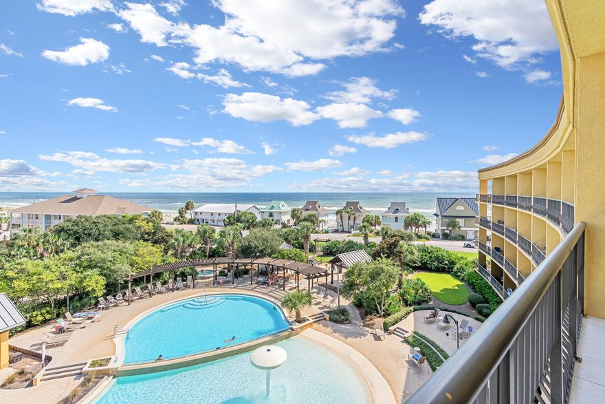 Dreamy Coastal Sanctuary! This light and airy TOP-FLOOR condo offers breathtaking views of the Gulf of Mexico. Featuring an open and spacious floor plan with 1 bedroom with ensuite bathroom and a private bunk room with a full bath attached. Fully furnished and turn-key rental ready, this condo comfortably sleeps 6 guests. Take in the stunning panoramic view from your expansive and private balcony.Located in a low-rise resort with only 64 units, you'll enjoy a serene, vacation-oriented community. Beach Resort boasts top-notch amenities, including two pools with kids zero-entry splash pad, expansive pool deck, grills, covered picnic areas, and a relaxing hot tub. One of the pools is seasonally heated, attracting guests year-round. Private deeded beach access is located just across the street on Scenic Gulf Drive, and with several restaurants nearby, convenience is at your doorstep. This unit also comes with an oversized end garage parking spot, large enough for a car and golf cart, adding extra value to this already ideal property. 

Whether you're looking for a personal coastal escape or an investment property, this condo offers the perfect blend of relaxation and short term rental potential. Condos at Beach Resort do not come available often, especially on the 5th floor. Secure this rare beauty today!