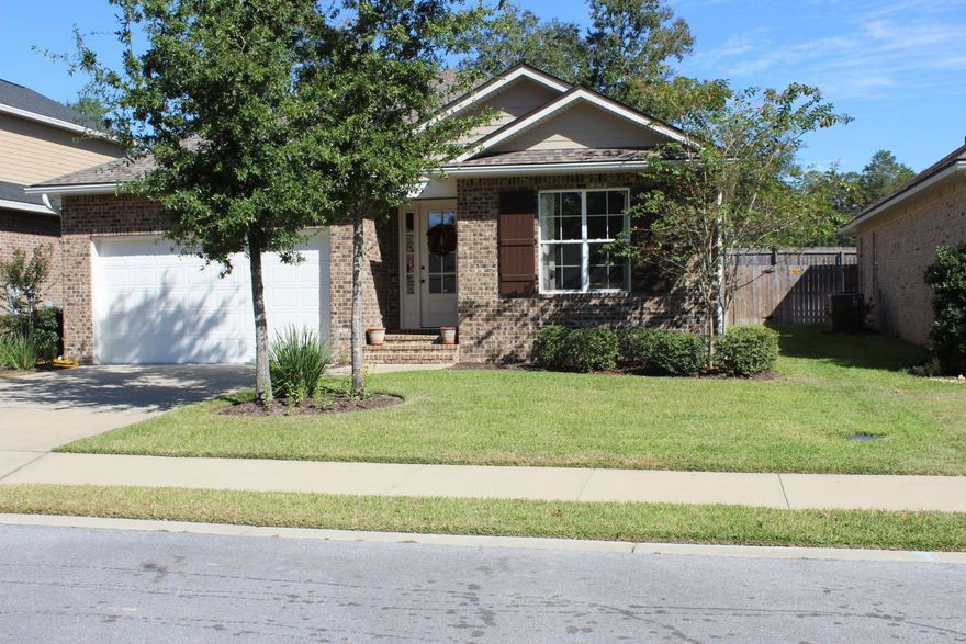 Huff Homes resale so you know this home won't last! Gently used 3 Bedroom, 2 Bath home with a fenced yard and within walking distance to the elementary school. This home has an open floor plan with today's busy lifestyle in mind. Huge great room perfect for gatherings that opens to the kitchen so the cook can be included in the fun. Upgrades include crown molding throughout, wood flooring in all rooms (tile in wet areas), custom shelving in master closet and hallway closet. Love to cook? Kitchen has gas convection stove/oven and is vented to outside. Natural gas heat, hot water heater, stove/oven plus gas for dryer & natural gas line for outside grill.