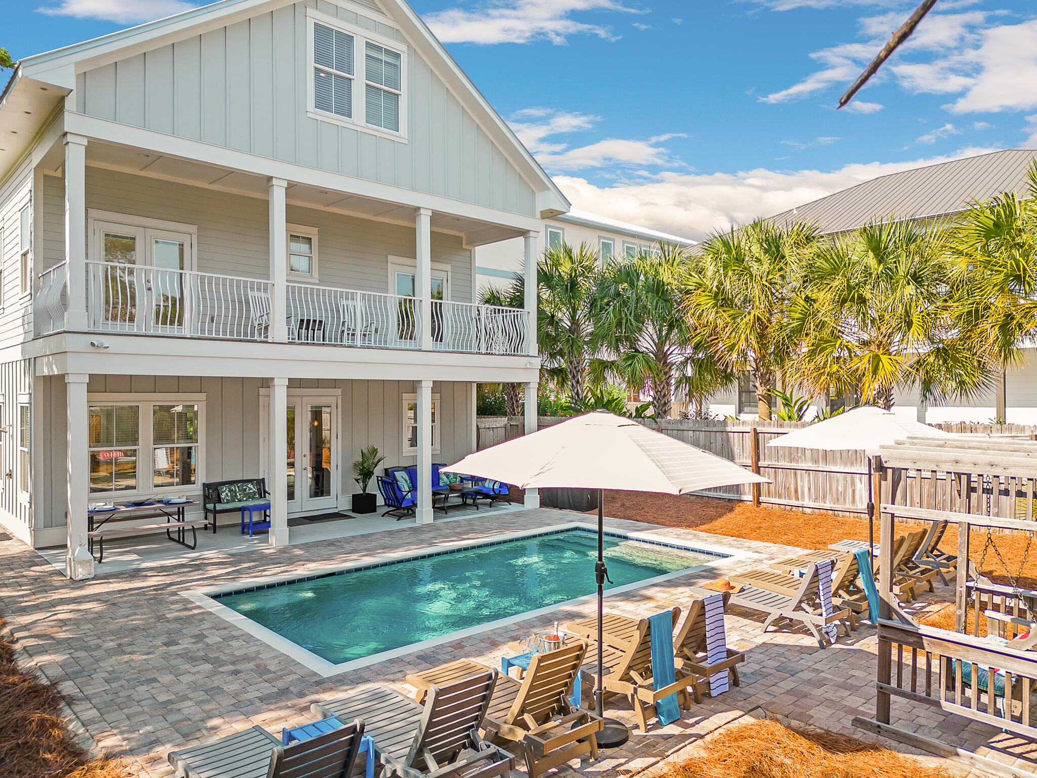 Serenity awaits in Crystal Beach!  This beautifully appointed 7-bedroom, 7-bath modern coastal cottage is an easy walk to the most gorgeous beaches on the Emerald Coast!  Conveniently located near Destin Commons, this spacious vacation home is steps away from access to fantastic shopping and unlimited dining experiences. Open concept living at its finest; the main floor living area includes a spacious kitchen with an extra-large quartz island, harvest dining table for family-style dining, and a breezy and comfortable living room in which to unwind after a long day at the beach!  Main floor living includes 2 spacious king suites, with a second floor that boasts 4 king-sized suites and a central bonus family room perfect for casual relaxing.
