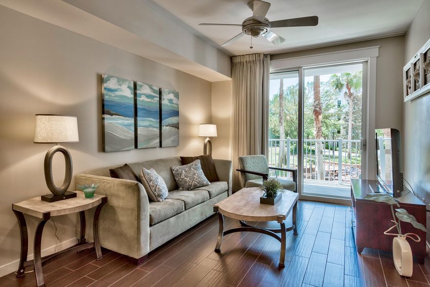 Light and bright one bedroom condo with balcony offering views over the Grand gardens and pool. Wood look plank tile flooring throughout for easy maintenance and style. Open floorplan featuring kitchen with granite counters, dining area and living room with queen sleeper sofa for extra sleeping space. Bathroom has tile flooring, double vanity and tub/shower combo. Fully furnished and rental ready! Owners and guests have access to the resort style pool and fitness center at the Grand Sandestin, and owners enjoy exclusive access to the private Solstice Club.