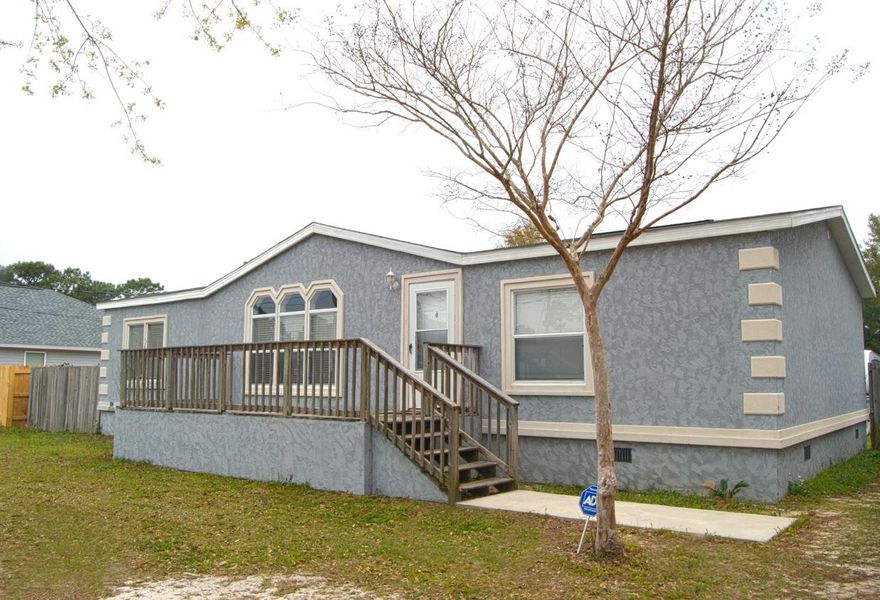 ExtraExtraRead all about ityes all of it!! Rarely, does a great offering like this one hit the market at such a reasonable price. With an upgraded stucco surfaced home, a very large backyard fenced lot, and an oversized detached garage you will have plenty of space to do the things you like to do with No HOA restrictions.
There have been many upgrades made in the last couple of years (Click on the Photos) that should provide the buyer with additional Peace of Mind, and cost savings. They include: A new air conditioning system, a new roof, new flooring in the bathrooms, and several new stainless steel appliances.
Priced to sell, and located just minutes away from the beach & Navarre's most popular restaurants, stores and entertainment outlets'. Come see it today!