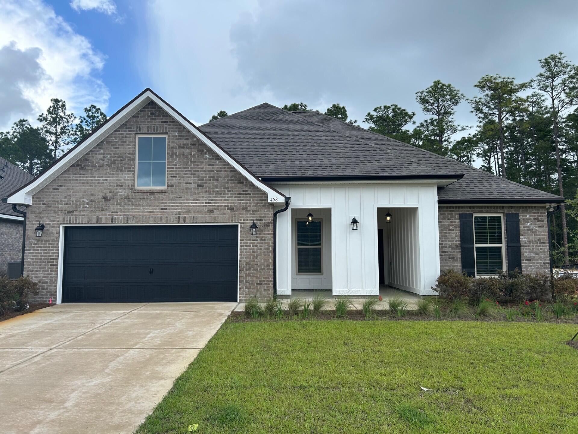 The HICKORY III G in Bird Song at Hammock Bay community offers a 5BR, 3BA, open design with formal dining room and separate den. Upgrades added (list attached). Features: double vanity, garden tub, separate custom tiled shower, and walk-in closet in master bath, kitchen island, walk-in pantry, covered porches, boot bench, crown molding, recessed lighting, framed mirrors, smart connect WIFI thermostat, smoke/carbon monoxide detectors, landscaping package, architectural 30-year shingles, flood lights, and more!Energy Efficient Features: water heater, kitchen appliance package, vinyl low E windows, and more! Energy Star Partner.