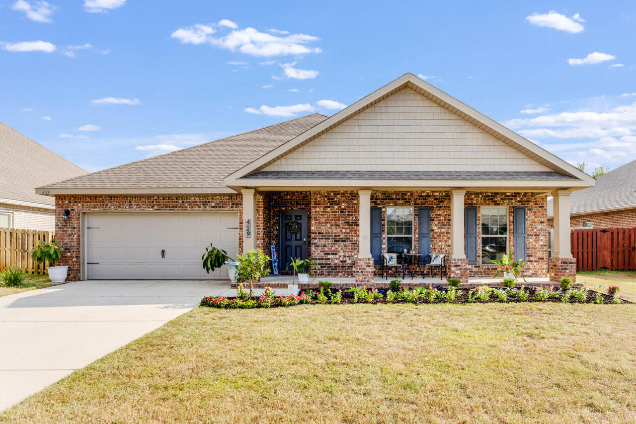 BETTER THAN NEW CONSTRUCTION! Welcome to 429 Chickadee Street, where thoughtful upgrades and modern style make this home stand out. From the moment you walk in, you'll notice the details that set it apart -- crown molding, updated lighting and bathroom fixtures, and a beautiful tile shower that adds a touch of luxury. The kitchen features smart appliances that make everyday living easier, while the open layout flows seamlessly to the screened-in porch, perfect for morning coffee or evening relaxation. Step outside to enjoy your very own above-ground pool, creating the ideal backyard retreat.Skip the wait and the plain finishes of new construction -- this home has already been enhanced with the features you want most, inside and out. Additional features include assumable VA Loan for VA eligible buyers at 4.5%! (PITI $2,600/month) Stainless steel Samsung appliances, washer and dryer, granite counters throughout, recessed lighting, multiple extra closets, large master closet (80sqft!), covered front porch, screen enclosed back porch, backyard fire pit, 36'x16' above ground pool, and MORE Don't miss your chance to own this move-in ready gem!