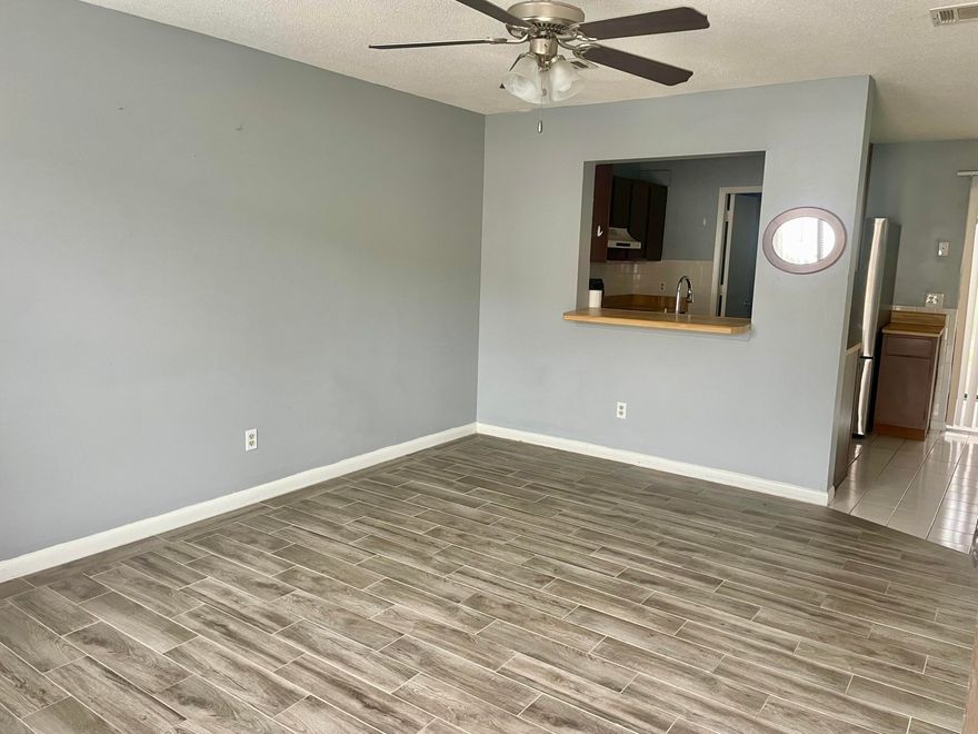 Comfortable townhome available for rent immediately. Easy maintenance lvp and tile flooring downstairs. two bedrooms on the upper floor. Small Florida room/ extra space off the dining area. Within walking distance to school and a park. First month rent and deposit required. No pets, no smoking.