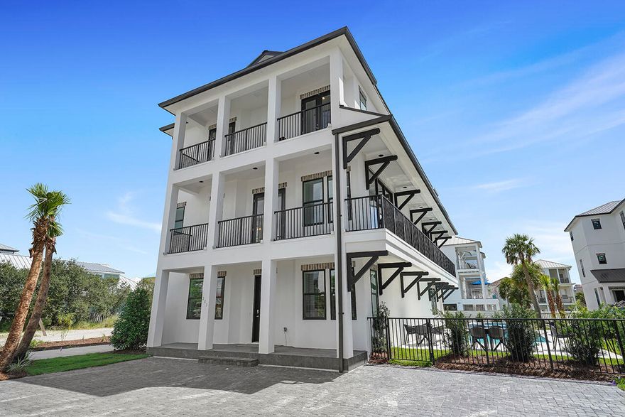 This one-of-a-kind new construction home is officially complete! This 3-story beach house has 10 bedrooms and 9.5 bathrooms. This house isn't short of space. The first level has 4 bedrooms, 3 baths and a media room. The second floor consists of the gourmet kitchen expanding into the dining and living areas with 3 bedrooms and 3.5 baths. Continuing on the second floor is the wrap-a-round balcony overlooking the pool and stunning gulf views. The third floor has the primary bedroom and 3 remaining beds. Elegantly designed with an open-concept in mind. All floors are accessible by stairs or elevator. Being in the heart of Miramar, you are within 3 mi. of Destin Commons, Silver Sands Premium Outlets and a multitude of 5-star dining options.