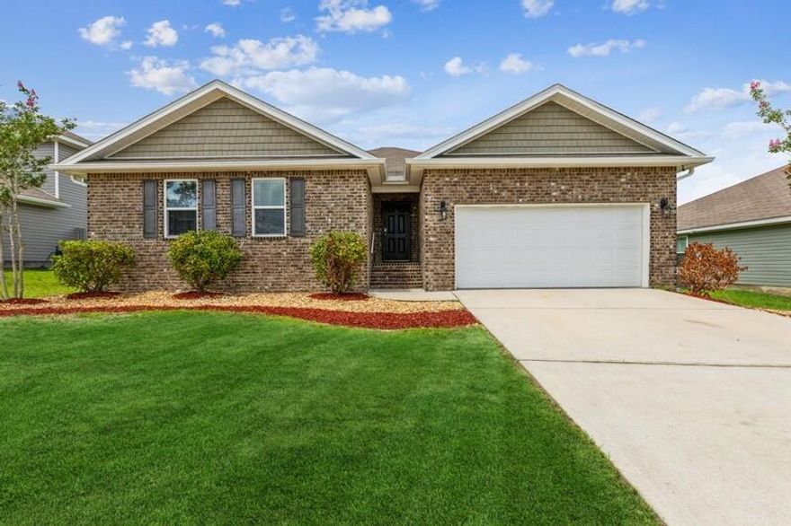 This home has an open concept, split bedroom floor plan. The Large kitchen with island hosts tons of cabinet space as well a large pantry, smooth top range, microwave and dishwasher. the Owners Suite has dual vanities, its own garden tub, spacious shower and a beautiful walk-in closet. schedule your showing today!*Grass in photos are a simulation