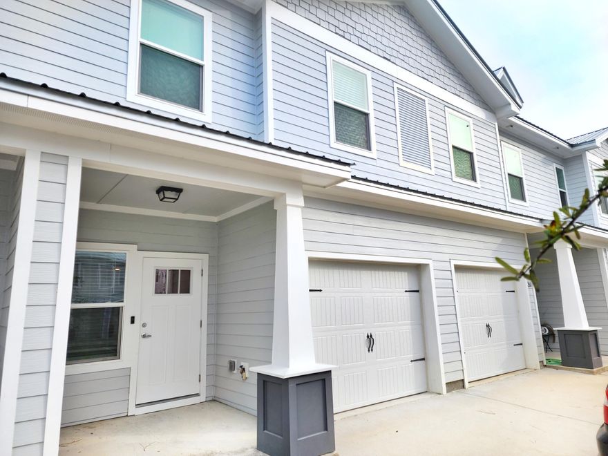 Under contract with Kick Out Clause - TAKING BACK UP CONTRACTS. Please Show! Welcome home! This is one of the rare townhomes in the Verandas with a garage and   it's sure to impress with several upgrades. Quartz counters throughout, tiled kitchen backsplash and SS farm sink, screened porch, 6-inch crown molding, LVP downstairs and carpet upstairs, Whirlpool kitchen appliance package with Maytag washer and dryer. The large primary suite features great natural light, a large walk-in closet, and a double vanity in the en-suite bathroom. 9-foot ceilings throughout make the home feel spacious. Upgraded quiet-close garage door. Enjoy the summer months at the neighborhood pool.