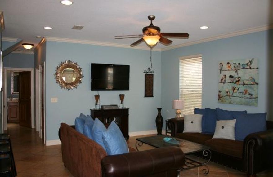 SOLD FURNISHED! Newly refreshed 4 bedroom 3 bath home in Villages of Crystal Beach. It has been painted, installed new wood laminate flooring, new mattresses, bedding, accessories and more! 9 Foot ceilings on both floors. Very open floor plan with a long breakfast bar and Lots of seating in the dining and Living room. This home is great for a full time resident or Keep on the rental market for a great rental income producing property. First floor has Kitchen, Living, Dining, King size bedroom, full bath and full size utility room with sink. Second floor has a huge master bedroom and bath with double vanities and huge jacuzzi tub/shower combination. Guest bedroom has a Queen bed and 4th bedroom has custom bunks with full over full. Check out the fabulous Pool