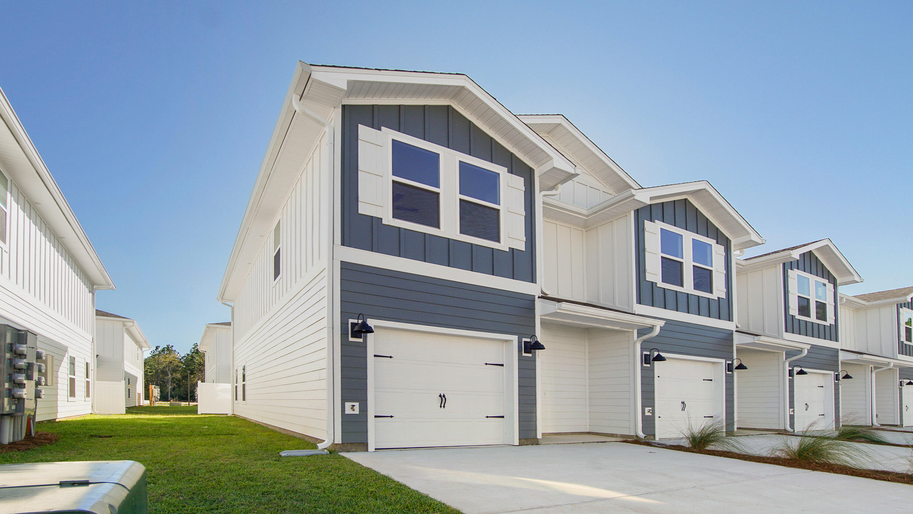 This stunning townhome is located at 147 Sparrow Avenue in Hawk's Landing. This townhome features the Palm exterior floor plan and is a perfect blend of style and comfort. Step inside to find a welcoming space that boasts 3 well-appointed bedrooms, 2.5 elegant bathrooms, and a convenient 1-car garage. As you traverse the long hallway, you're greeted by an expansive open-concept kitchen, living, and dining area, designed for entertaining and everyday living. The kitchen serves as the culinary center with its spacious center island, granite countertops, and a premium Whirlpool(r) stainless appliance package. The living area is well illuminated with exterior windows and a glass door leading to the back patio.
