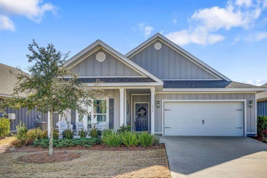 Florida sunlight abounds in this cozy and well-maintained home in gated Firefly at Hammock Bay! Featuring a 3 bedroom open floor plan, you'll be pampered with lawncare and irrigation included, along with access to the private Firefly swimming pool, pickle ball courts, and owner clubhouse. Your new kitchen affords ample cabinetry, granite counters and a spacious corner pantry.  The living room is open to the kitchen and dining, however each living space is afforded its own section in this excellent floor plan!  Both the front porch and the back screened porch with sunshade invite daily usage, as well as your extended paver patio which is perfect for enjoying the red and orange sunsets! In addition, Firefly