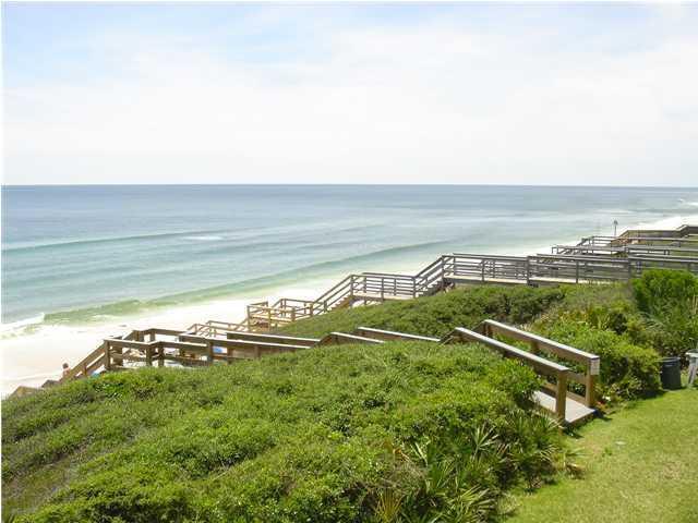 Rare gulf front west end townhome in this unique 5 unit complex. On a bluff with great views of the beach and water. These rarely come on the market. The last sale was 2008. New sleeper sofa and matching loveseat, coffee table, side tables, and lamps. New Apple TV. Replaced electrical panel-$1000. Booth Bay townhomes have all new siding and exterior paint. Also new railings to the beach. More photos coming soon.