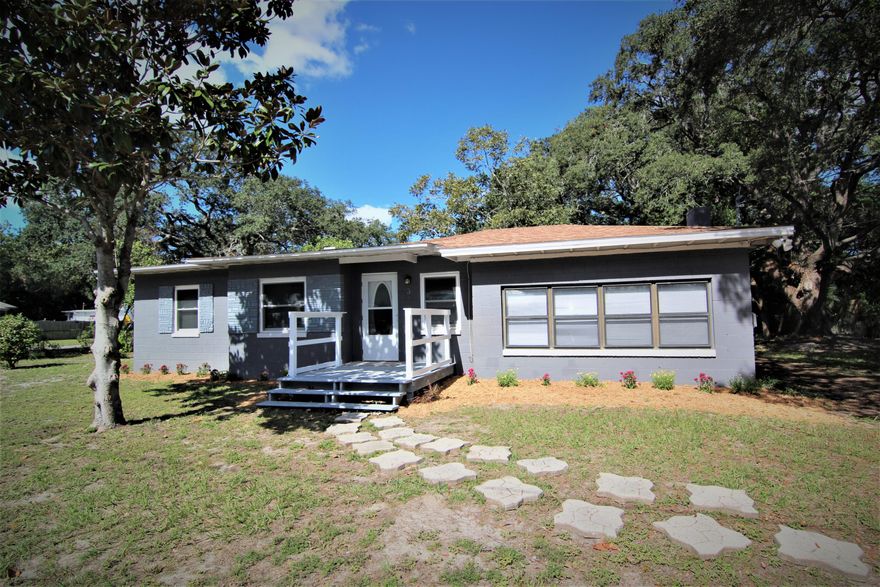 LIKE BRAND NEW!! WHY RENT WHEN YOU CAN BUY? Take a look at this totally updated home situated on a large corner lot in the heart of Fort Walton Beach. Step inside and be delightfully surprised with designer paint color and tile flooring throughout. Light and bright living area with crown molding, tile flooring and fireplace for those cozy winter nights. Dining area has French doors that open to the living room. Kitchen has new cabinets, new appliances and lots of counters for added workplace. All bedrooms have plush new carpet and ceiling fans. Hall bath has a tub shower combo with surround. Outside laundry room that can also be used for storage. New electrical throughout and lots of new windows. Fully fenced lot with endless possibilities. Close to Hurlburt and Eglin AFB, downtown Fort Walton Beach, schools and beaches.  Call today to take a look inside at this price it will not last long.............
