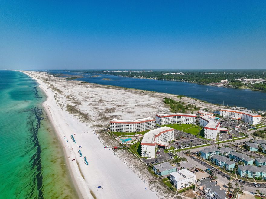 Waterfront and Gated Community w/ Private Beach! Penthouse Level + Waterfront Living at its Finest! Experience island living at its best in this top-floor El Matador condo--the BEST DEAL on Okaloosa Island! This 2-bedroom, 2-bathroom gem boasts stunning views of the Intracoastal Waterway and Gulf of Mexico from your private and oversized balcony. The updated kitchen features expansive countertops and elegant white cabinetry. With new furniture and chic coastal decor, this condo is move-in ready or perfect for vacation rentals. El Matador offers exceptional amenities, including two pools, hot tub, sauna, fitness center, basketball and tennis courts, plus beach access. Minutes from dining, shopping, and entertainment, this is the beach retreat you've been waiting for! Welcome to your dream..