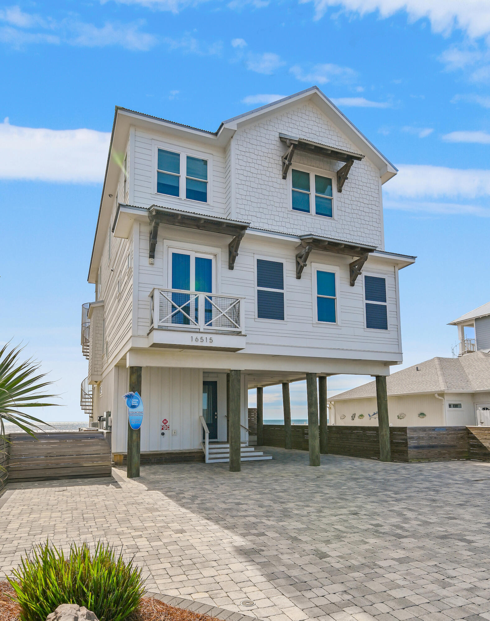 Welcome to your dream getaway on the pristine shores of Panama City Beach! Nestled directly across from an iconic oyster bar, this residential oasis offers a perfect blend of coastal charm and opulent living. As you step inside, you're greeted by an exquisitely designed interior; the open living area is adorned with lavish furnishings and oversized windows that frame breathtaking views of the turquoise waters. The spacious kitchen features top-of-the-line appliances, sleek countertops, and ample space for creating culinary delights. Step outside onto the expansive patio, where a private pool awaits. Lounge in the sun, take a refreshing dip, or indulge in a leisurely soak under the stars - the choice is yours. With direct access to the beach, you can easily stroll along the
sugar-white sands and dip your toes in the crystal-clear waters whenever you please.
Located just steps away from the acclaimed Dusty's Oyster Bar, you'll have easy access to delicious seafood delicacies and vibrant nightlife. Explore the local shops, dine at waterfront restaurants, or simply revel in the laid-back atmosphere of Panama City Beach.