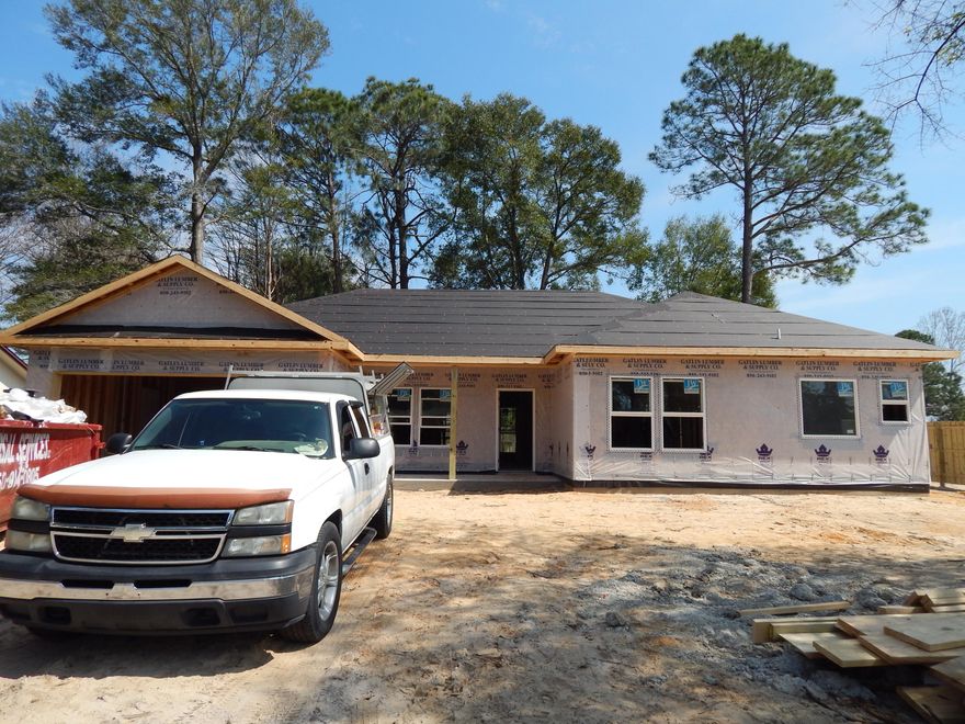 EXPECTED COMPLETION April 2017! Be the first to live in this brand new home, located conveniently in Fort Walton Beach!! One-story, Craftsman Style Brick & Hardie Board! Energy efficient! Wood Cabinets, Granite Counter tops, Ceramic tile throughout except for carpeted bedrooms! Beautiful 'knock-down' textured ceilings throughout home (no popcorn!) Large/Open Kitchen/Living area. This home has a Living Room AND a Family Room! Gorgeous Kitchen features an Open Breakfast Bar, granite counters, stainless steel appliances (built in microwave, smooth top stove, dishwasher & refrigerator), wood cabinets & a pantry! There is a Breakfast nook and a formal dining room as well! The Spacious master suite features a treyed ceiling. The Master Bath has a walk in closet, dual vanities, Garden Tub and Tiled Walk-In Shower! Room Sizes are estimates from Original Plan - Buyer to verify.  (Features subject to change at Builder's Discretion...Please verify all features in contract.