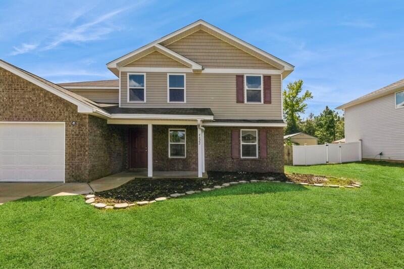 Discover your dream home in South Crestview! This stunning 5-bedroom, 3-bath residence spans 2,597 square feet and is just minutes from shopping and local eateries. Enjoy new carpet throughout and a freshly pressure-washed exterior. The generously sized kitchen features an inviting island and practical pantry, perfect for culinary enthusiasts. The master suite offers an oversized closet, luxurious garden tub, separate shower, and double vanities. Step outside to a back deck ideal for entertaining, complemented by an expansive yard with a convenient side gate entry. Experience the ultimate blend of comfort, style, and prime location! Your Oasis Awaits!!!