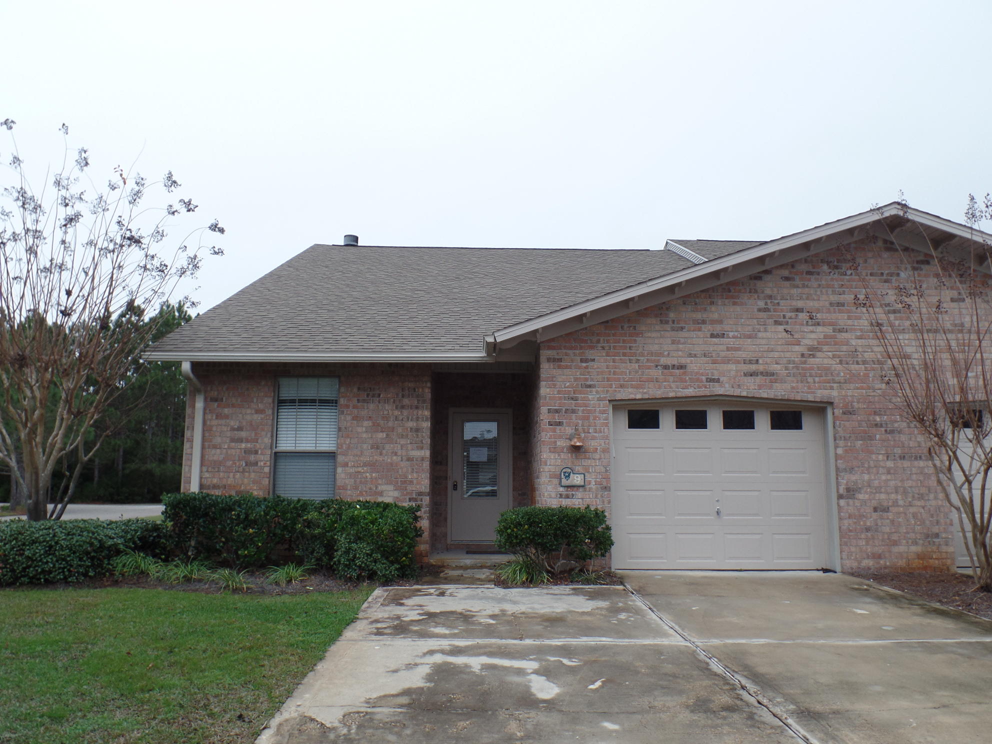 REO - List Price $137,900. What a great place to call home!! Very nice end unit brick front townhome with 3 bedrooms, 2 baths with an open living, dining & kitchen. The living area features a vaulted ceiling, a nice fireplace and opens onto the screened porch. There is also an open living area on the 2nd floor which is perfect for an office or game room. The one car offers great storage for your beach gear. This home is in a great neighborhood near the beach, shopping, schools, restaurants and more. Right where you want to be!!
