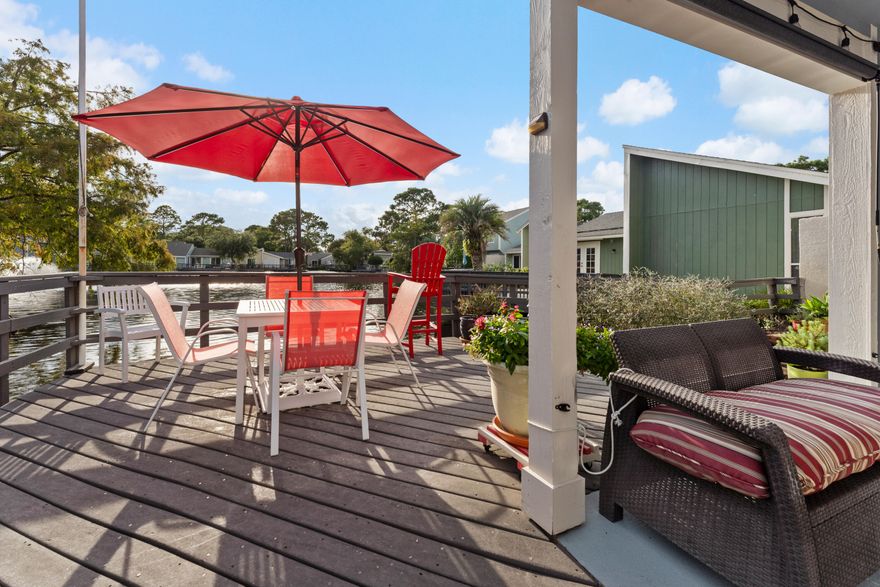 Went under contract while off market. ONE LEVEL cottage with expansive lake views and oversized carport PLUS 2 outdoor storage areas is a true Sandestin gem! Countless upgrades and modifications for easy resort lifestyle! Travertine floors throughout, vaulted ceilings, solar panels to reduce electric bills, golf cart charging in carport and much, much more! Adorable from the inside and out!  A remarkable opportunity for a 2nd home, vacation rental or a primary residence. Short term rentals ARE permitted. Impressive and updated with unparalleled views of the  lake! Feed the turtles right from your deck or cast a line into the fully stocked catch and release pond. With 2 bedrooms on the main floor  PLUS generous outdoor space you will enjoy the abundance of space! and natural light