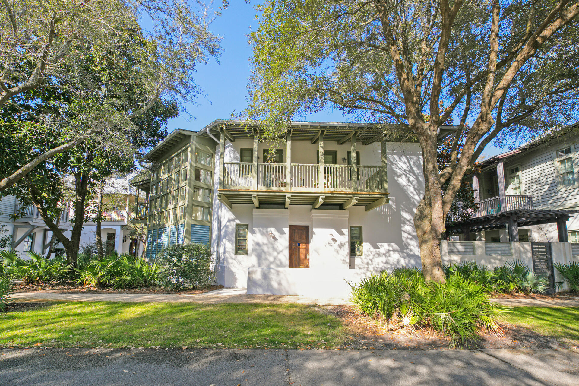 Located on East Long Green Park in Rosemary Beach, this charming home is one of the most unique in the community.  The large lot has ample room to add a 2 car garage plus carriage house and a small pool, according to information provided by the town architect. Living is easy with the open kitchen, living and dining space on the first floor.  The expansive, covered back porch extends the living space into the back courtyard.  One of two primary bedrooms is also located on this level.  A wall of windows leads the way to the 2nd floor with additional living space & the perfect spot to people watch over the park.  Two additional bedrooms (one a second primary and a guest room)  with private baths have access to the expansive covered, upper porches.