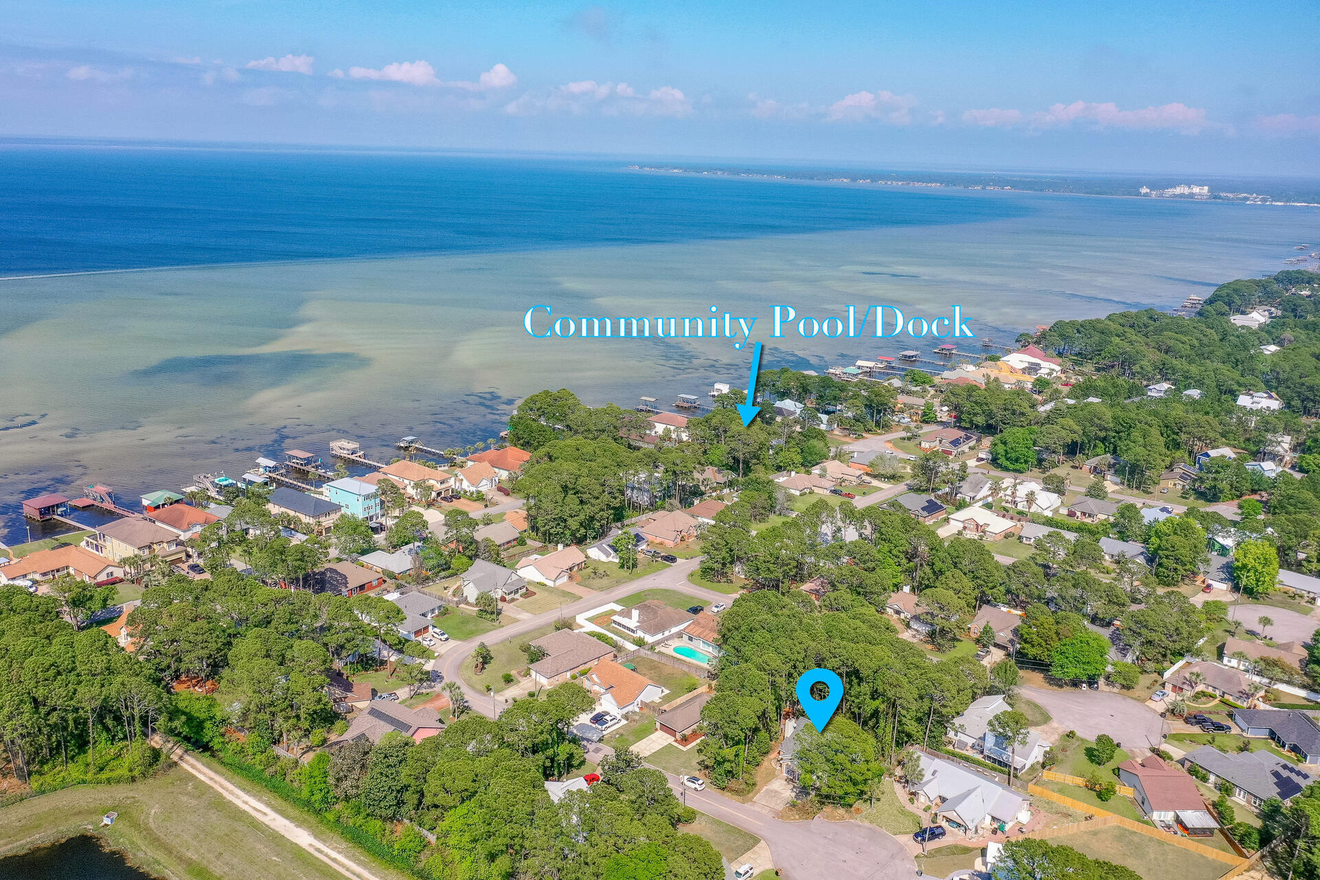 Begin your day w/a peaceful meditation on the community dock followed by an invigorating swim In the bay front community pool. After launching your boat at Legion Park just a few min away, catch the sunset on the Bay & finish the day dining alfresco in your backyard amidst twinkling lights from your private, covered pergola. Offering this waterfront lifestyle W/O the waterfront price, this charming home in Bay bridge Landing w/attached 1 BR MIL suite w/separate living area, loft & 1/2 bath is one of a kind. MIL suite also has separate entrance. Other features include renovated kitchen & large great rm w/ fireplace & high ceilings.Three add'l BRs + bonus rm provide extra spaces for office, play or exercise rm. The large, backyard is a private oasis w/ covered porch, large covered gazebo