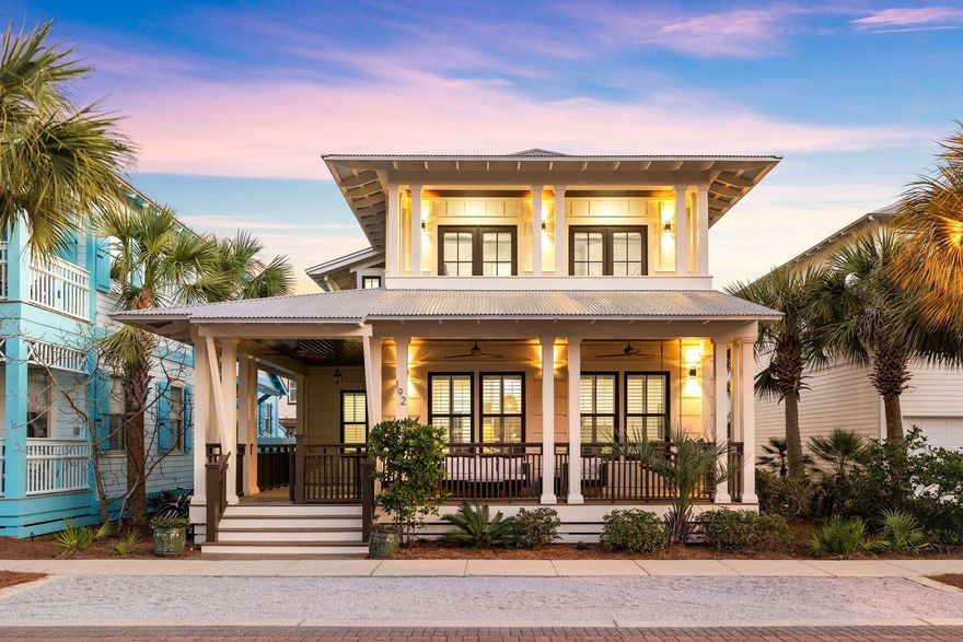 Traditional Southern-style living meets cool coastal charm at this beautifully presented Florida cottage in Seacrest Beach. Designed by renowned architect Greg Jazayeri, the home welcomes you with shallow steps leading up to a generous wraparound porch. This shady outdoor living space invites you to put your feet up and relax with a cool fruity drink beneath the gently turning fans. Inside the home, the meticulous attention to detail continues with six-inch wide pine flooring and ten-foot ceilings enhancing the spacious living area. It flows seamlessly into a dedicated dining area which is perfect for entertaining. The chef's kitchen makes it a pleasure to cook with a family-size gas cooktop and everything conveniently located within easy reach.