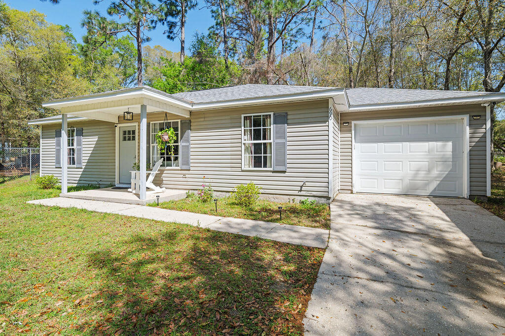 The home was completely remodeled in 2022 and move-in ready! Living room is connected to dining room, which has French doors to the backyard. Kitchen and laundry room flow together at the back of the house. Bedrooms are split floor plan, with primary bdrm on one side of the home and 2 additional generous-sized bedrooms on the other. Oct. 2022--new roof, water heater, garage door, front door with keypad lock, and French doors to backyard. Also, '22, entirely new Kitchen Whirlpool appliances, white cupboards, farmsink w/pulldown faucet, custom butcher block counters w/ matching open shelving, and LVP flooring throughout. Both bathrooms completely updated. Primary bath walk-in shower, closet & linen closet. New washer and dryer included and inside home. Lawn mowing included in rent. The tenant is responsible for paying all utilities, including but not limited to trash collection, water, cable, and internet; maintenance tasks, including clogged toilets or sinks and lightbulbs; cleaning the home and appliances; and watering the lawn and flower beds.
The property owner will assume the responsibility of mowing the lawn.
No guests are permitted over 5-night monthly stays. All occupants must be listed on the lease agreement.
Smoking is strictly prohibited on the premises. A maximum of two small pets weighing no more than 25 pounds are permitted, with pet rent at 40.00 per month. Parking is not allowed on the front lawn. However, boats, recreational vehicles, and trailers may be stored in the side or rear areas of the property.