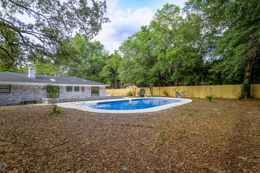 Act Fast wont last!! 100% Remodeled and move in ready! New Pool Liner INSTALLED!!!  2023 New Roof! 2020 Gas Hot Water Heater, 2015 Ac ,new lights and fans, new updated kitchen and baths granite! 2023 stainless appliances, new textured ceilings, new paint inside and special whitewash brick paint outside.   Perfect!! double lot .47 of a acre! New Privacy Fence,