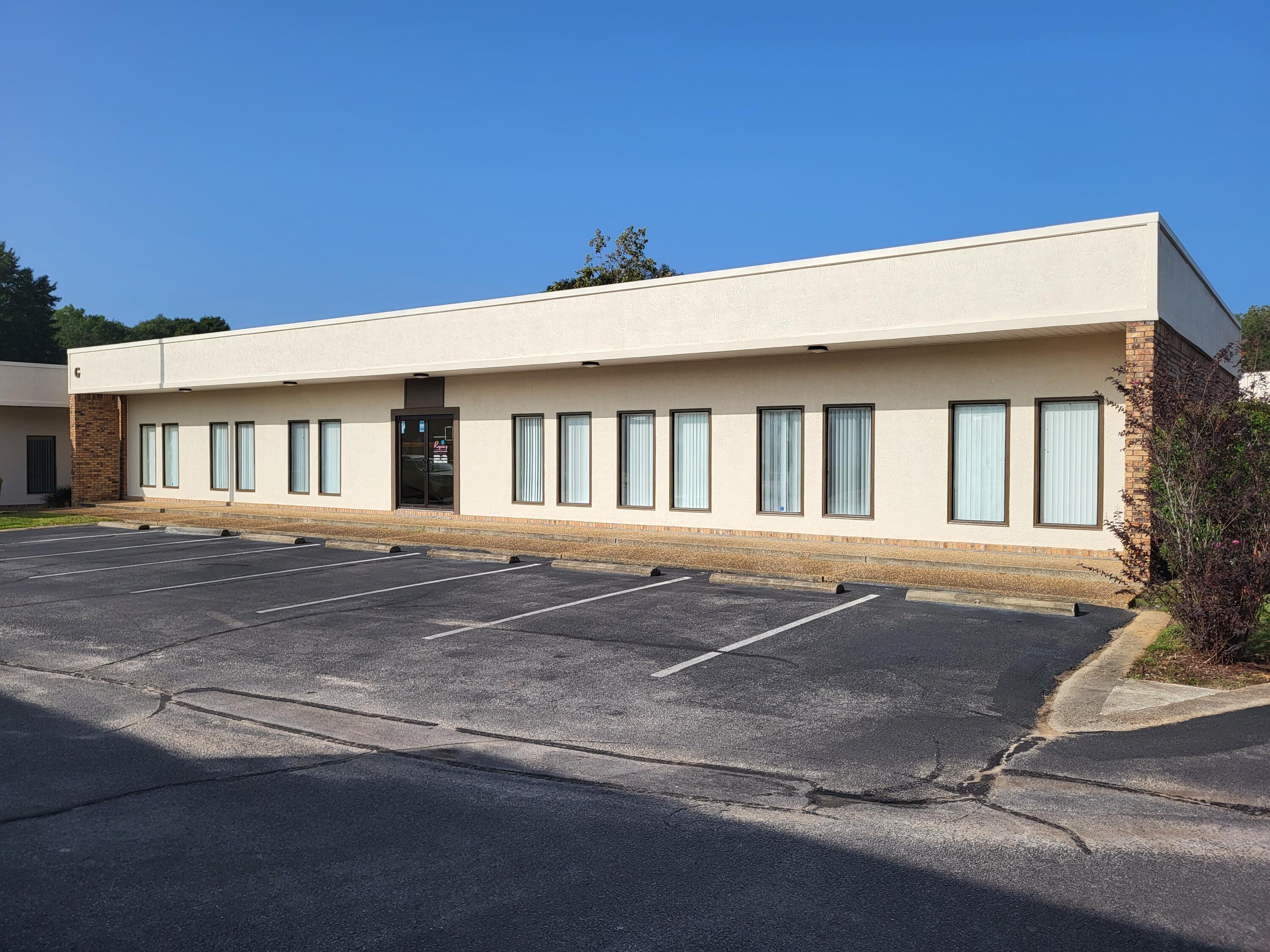 11 Offices, conference room, storage room, break area, 3 restrooms, front and rear entrances. Members of the owner are licensed Florida real estate brokers.
