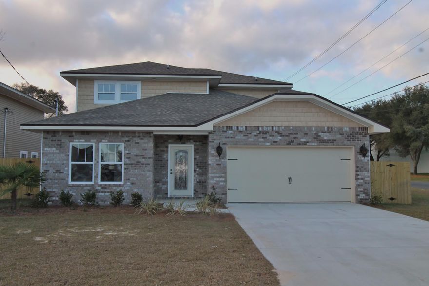 Brand new construction started on 8/15/2016. Awesome plan offered by a multiple award winning builder. This 2 Story (master is on first floor), 3/3.5 home has super curb appeal. There are 9 ft. ceilings w/ impressive crown molding, and 5 1/4'' baseboard throughout the main living areas and master. As you approach the front of the home, you will be quite impressed. The covered porch is very welcoming, and the attractive leaded glass door makes for a grand entrance. The formal dining room is at the left of the home's front. As you continue down the hallway, just past the stairwell, you will then enter the chef's delight kitchen which boasts maple cabinetry,custom cabinetry with crown moulding and plant ledges, 3 cm. granite countertops, Frigidaire Gallery series stainless appliances {including a commercial grade refrigerator/ freezer),and roomy breakfast bar. 9 Ft. ceilings, impressive crown moulding, and custom milled window and door casings are throughout the main floor. The first floor master suite is huge, has 2 walk - in closets, a double vanity, whirlpool garden tub and separate shower with glass enclosure. There are two A/C units. The additional 2 bedrooms are located on the second story, and each has a full bath. Insurance will be very reasonable, as home is built to today's code. Home has a Taexx, ''in the wall',' pest control system that is serviced from the exterior of the home, for owner's convenience. Yard will be fully fenced and beautifully landscaped, and comes complete with a sprinkler system, well, pump and timer. Area is very convenient to both bases, shopping, restaurants and 10 minutes from beaches. 