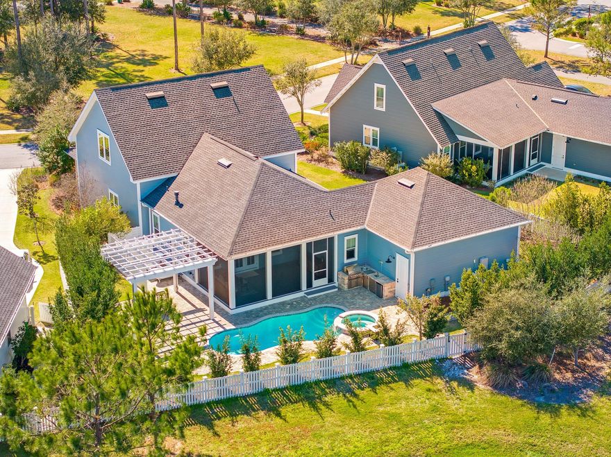 Stunning home in Watersound Origins nestled in the Pathways Phase overlooking a serene pond. 213 Sandchase Circle Offers 4-bedrooms, 3-baths with 2,584 sqft of exquisite living space. The main floor features a spacious primary suite with a soaking tub and standing glass shower. Complemented by a private office. Entertain in style with a Grand Kitchen that flows to the outdoor oasis including a screened in patio, heated pool, hot tub, summer kitchen, and outdoor serenity tubs, perfect for relaxation. High-end finishes and seamless indoor/outdoor flow makes this home a true gem in one of the area's most sought-after communities! Community amenities include a golf course, fitness center, trails, playground, resort-style pool. Offering the perfect blend of recreation and relaxation.