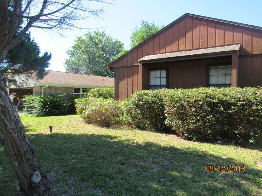 REO...Highly desirable location in Lake Lorraine Estates. Separate living areas. Family room has a fireplace and very large storage closet next to the fireplace. Enclosed rear patio overlooking the pool area. Storage building in the back yard. Lemon tree in the backyard. Hurricane shutters included. DON'T WAIT...YOU'LL BE TOOO LATE!!!