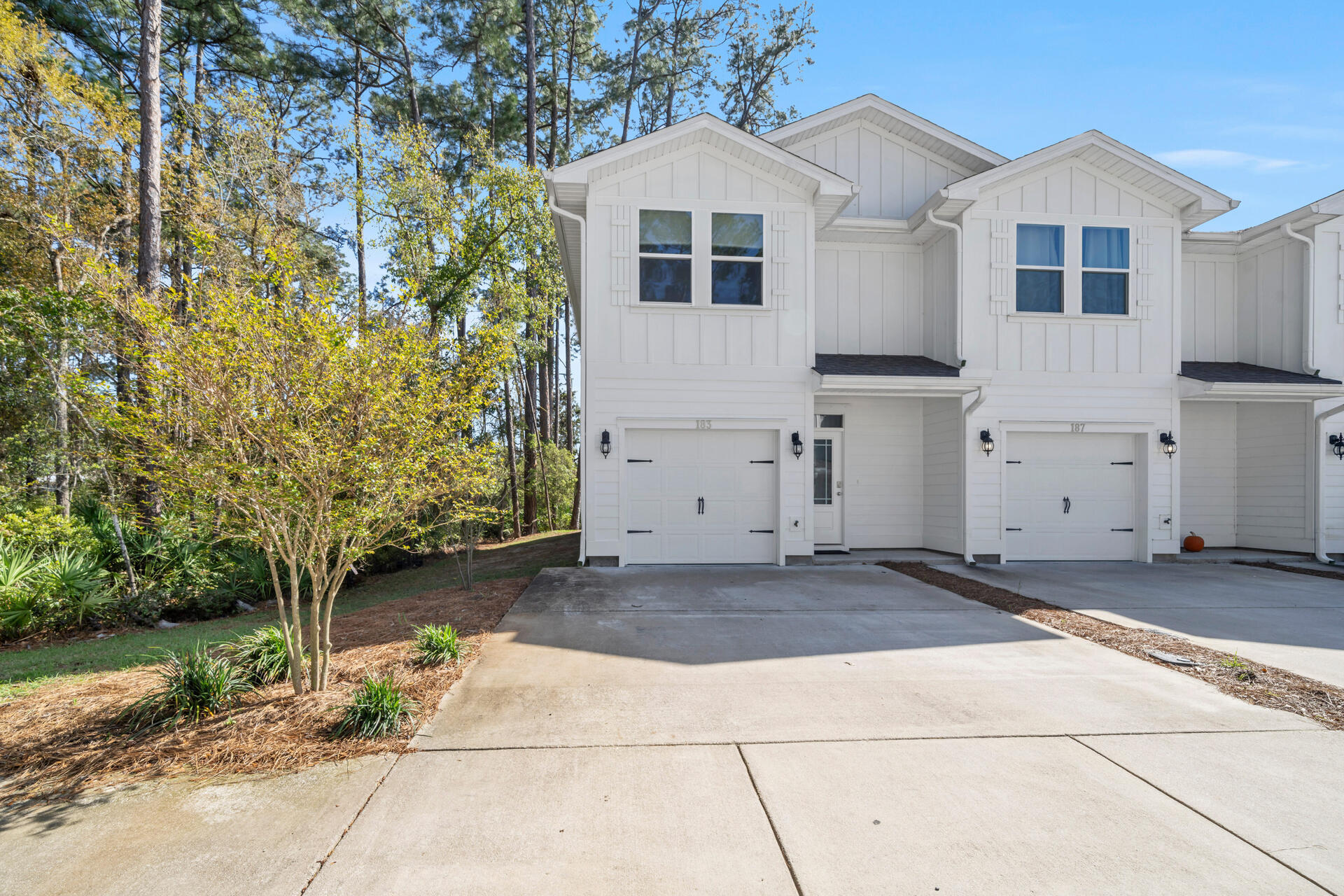 Welcome to your slice of paradise! This practically new 3-bedroom, 2.5-bathroom townhome, freshly painted and with modern updates, is nestled in the highly desirable Sandhill Pines in Santa Rosa Beach. Perfectly positioned behind Sacred Heart Hospital and just moments away from Grand Boulevard, indulge in the ultimate convenience of having top-notch healthcare facilities, shopping, and dining options right at your doorstep. Featuring an end unit with a 1-car garage, this home offers both privacy and functionality. Step inside to discover a bright and airy interior, complete with granite countertops, elegant white shaker cabinetry, brushed nickel hardware, and EVP flooring throughout. STR are allowed!!